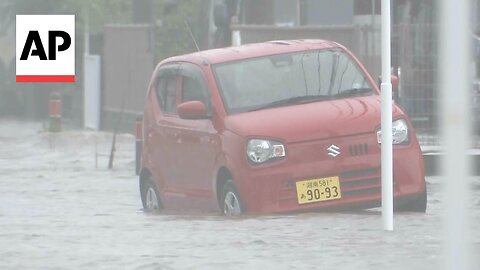 Heavy rain floods roads and disrupts transport in Japan.