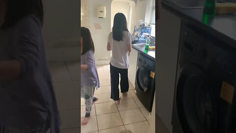 Baby boy eats chocolate ice cream while my girls help me clean the house