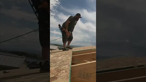 Sheathing the roof in 15 seconds.