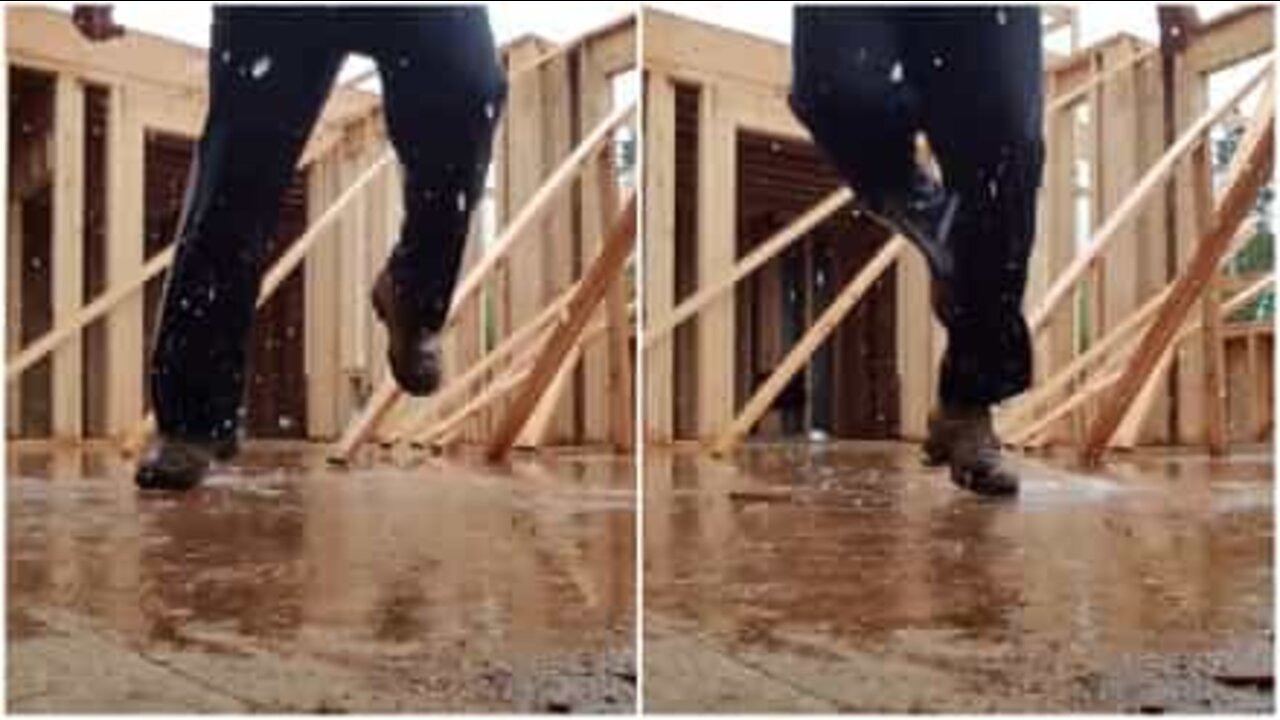 The rain doesn't get in the way of this construction worker's dance party!