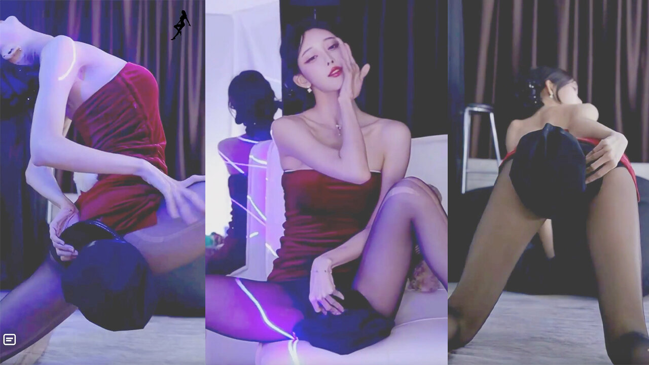 Sensual dance streamer performs in a strapless, form-fitting skirt and black stockings, showcasing her legs