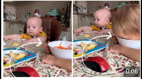 Hungry toddler sticks entire head in food bowl