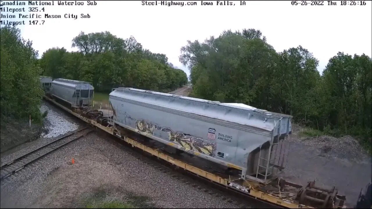 SB UP Manifest with 3 Derailed Cover Hopper on Flat Cars at Mills Tower on May 26, 2022