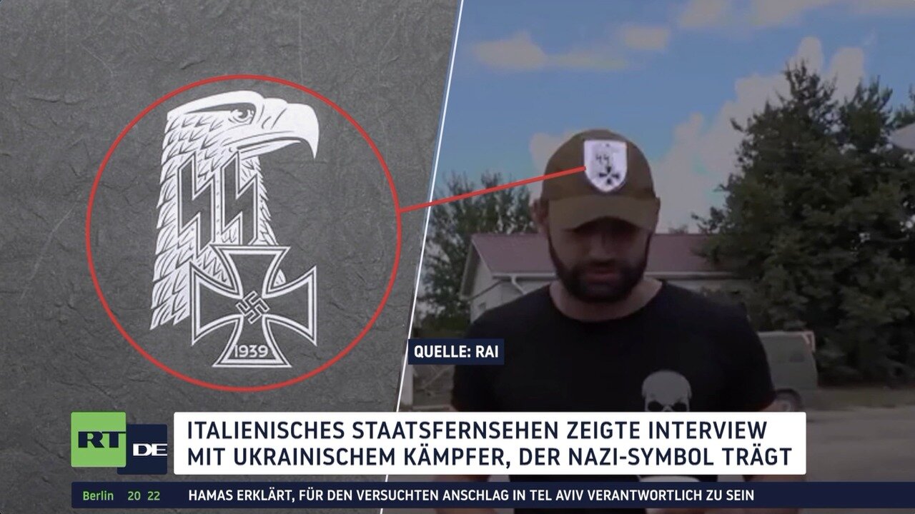 Ukrainischer Kämpfer trägt Nazi-Symbole während eines Interviews