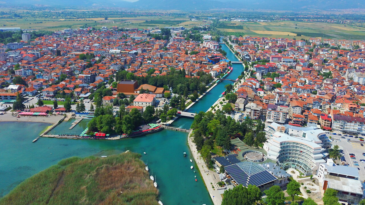 Flying above the lake and the river Crn drim in Struga