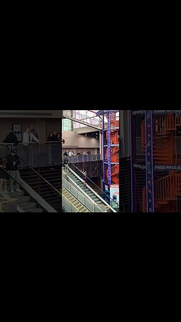 Junction 32, free fall jump slow motion. Girl runs then leaps from top of roof. caught on camera.