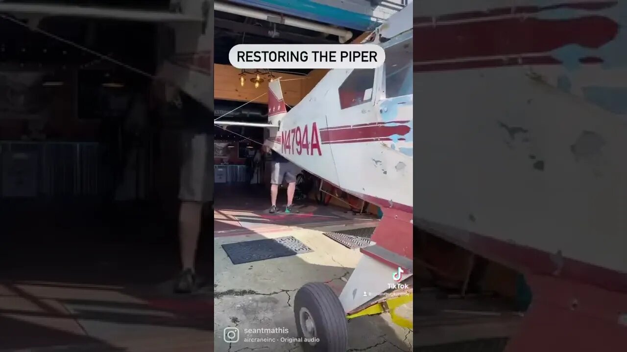 Pulling the Piper airplane out to be turned into a military aircraft.
