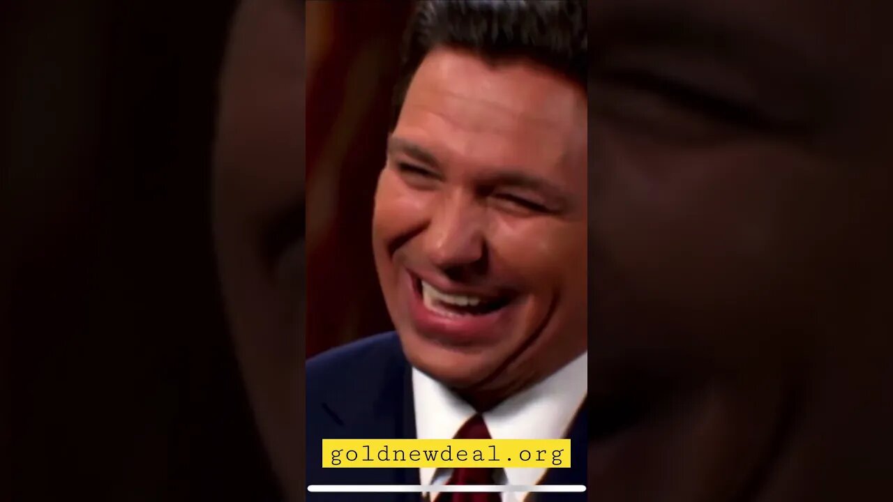 Ron DeSantis laughs