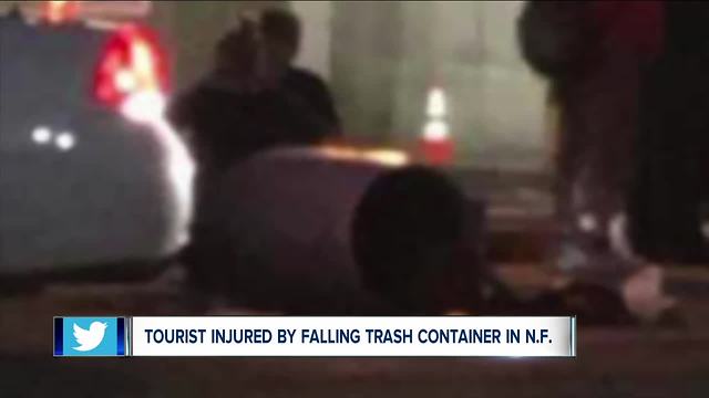 Tourist hurt by falling garbage can