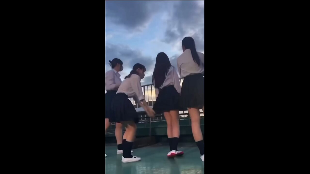 Couple of japan students lifting the skirts