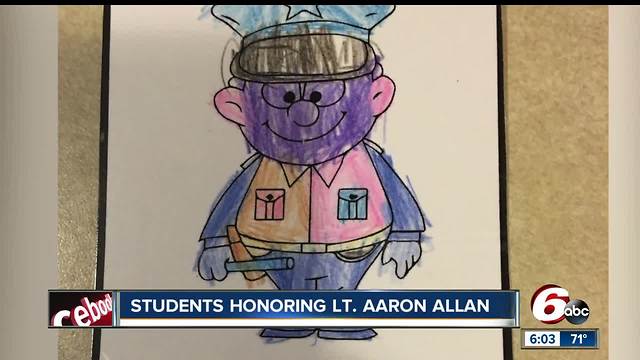 Students honored Lt. Allan with notes on officer cruisers during funeral service