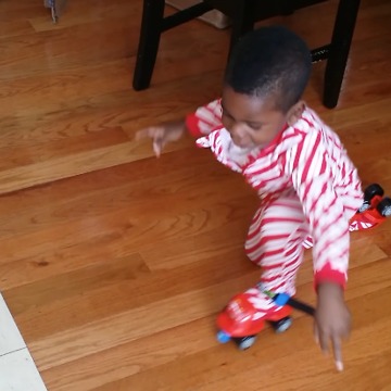 A Little Boy Struggles To Skate