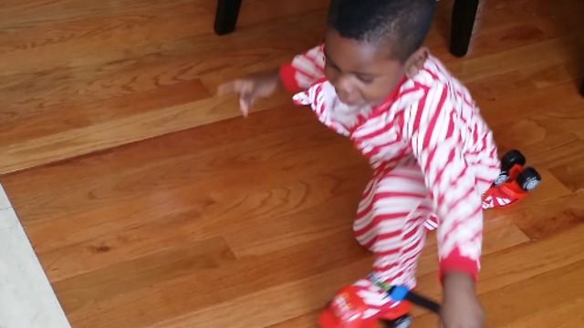 A Little Boy Struggles To Skate