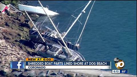 Debris from abandoned boat lined dog beach