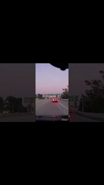 CAR DRIVES THROUGH MYSTERY BOX ON FREEWAY