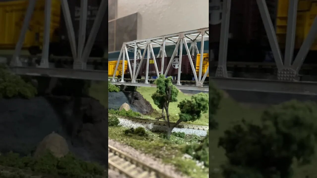 N scale BNSF Geeps crossing a bridge