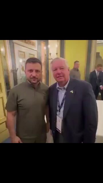 Zelensky is interviewed by an ugly old woman.