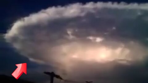 Large round cloud in the upper sky with bright light in the middle [Mystery]