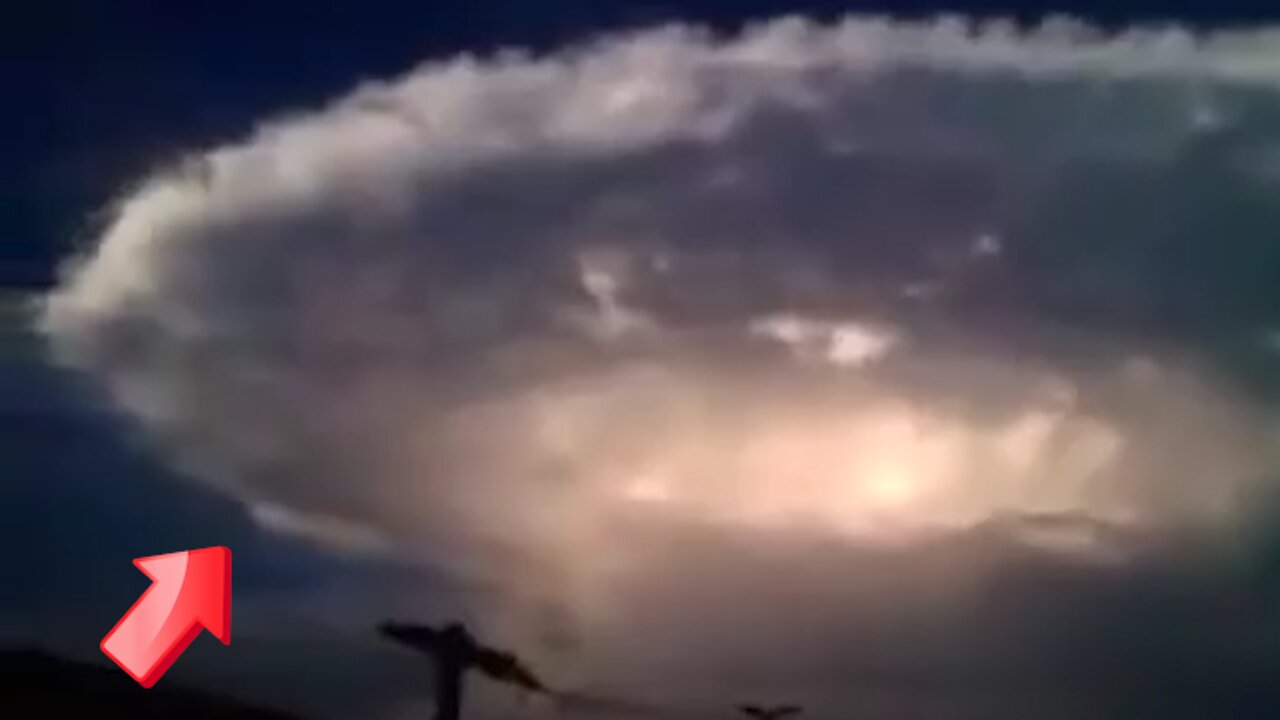 Large round cloud in the upper sky with bright light in the middle [Mystery]