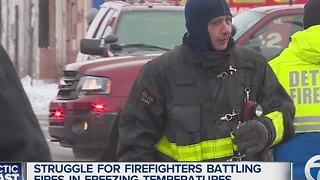 Firefighters struggle to fight fires in freezing temperatures