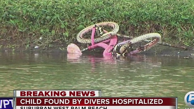 Child pulled from water in suburban West Palm Beach