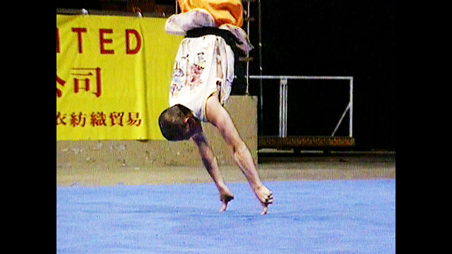 Shaolin Monk Balances On 2 Fingers