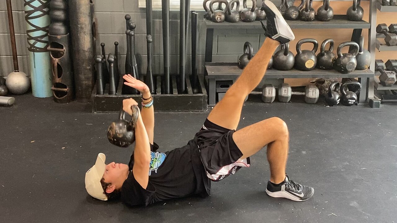 Mobility Monday: Kettlebell Uni-Lateral Press with Leg Bridge