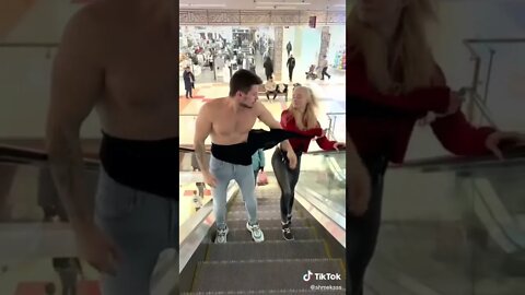 ❤️Shmeksss - Escalator Prank Teeshirt woman surprised epic #shmeksss​ #prank​ #reaction​ #comedy