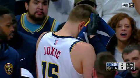Jokic's head SPLITS after Jaren Jackson Jr ELBOWS him for a tough jump shot! 😰