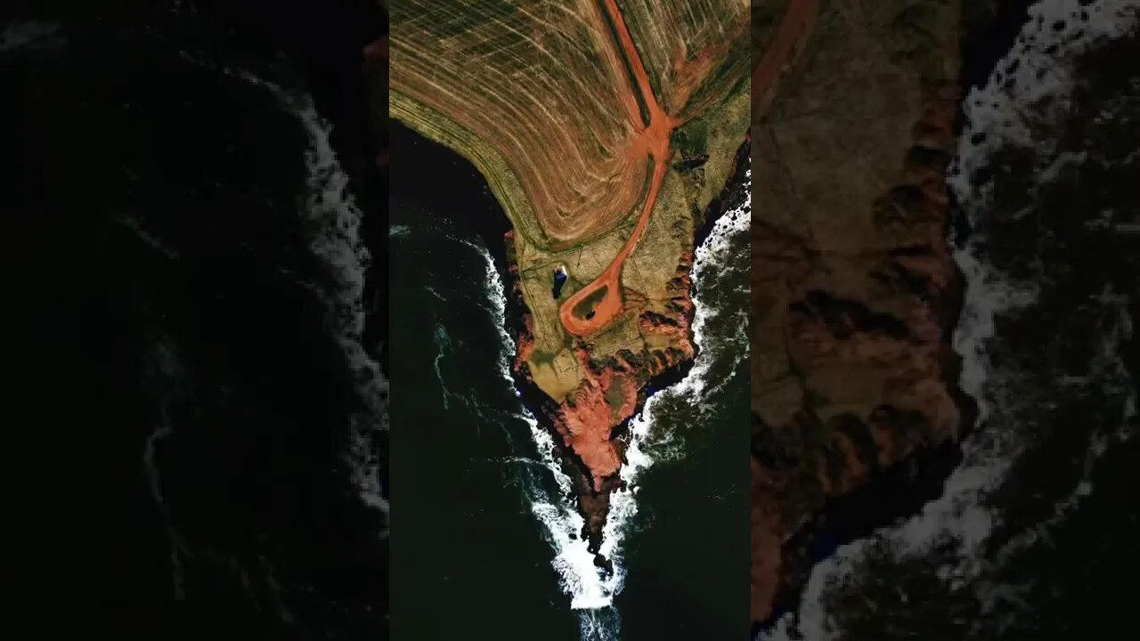 Red sand and white waves