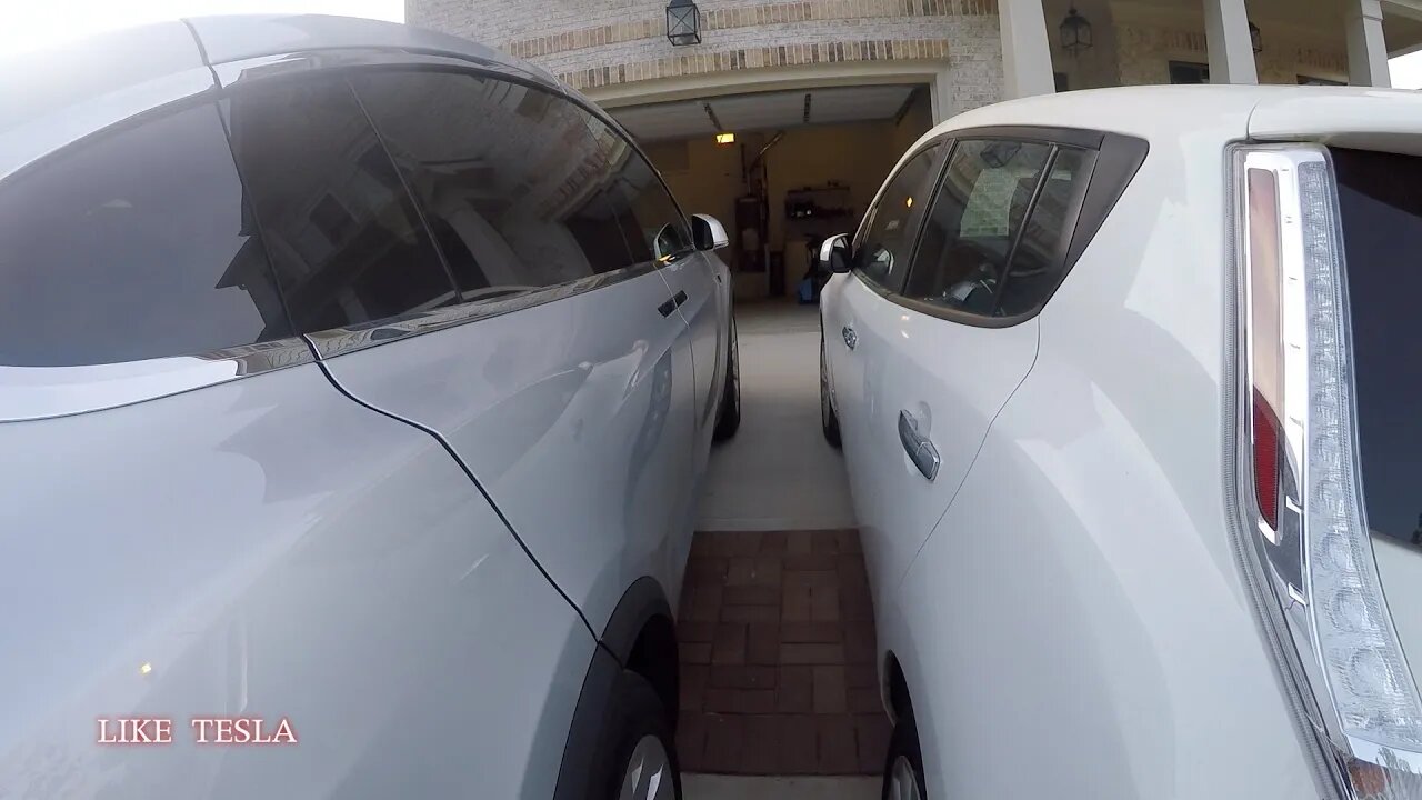 Tesla Model X Falcon Wing vs Nissan Leaf