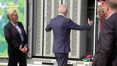 In the middle of new charging station show, Biden tells a story about a map from his Obama years.