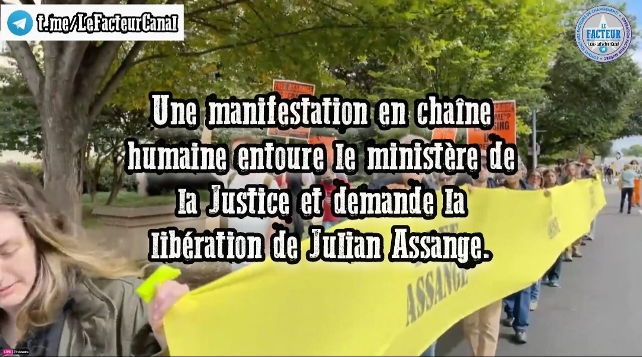 Une manifestation qui entoure le ministère de la Justice et demande la libération de Julian Assange.