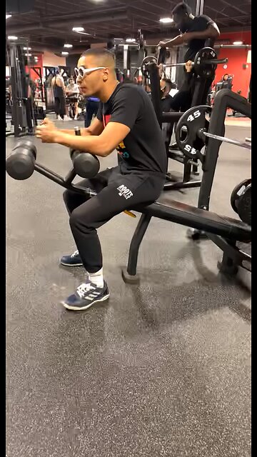 Young lad captured lifting at gym