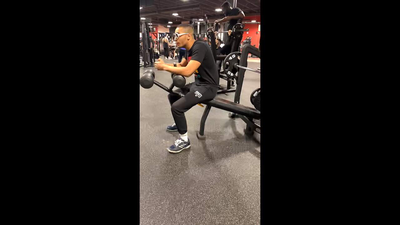 Young lad captured lifting at gym