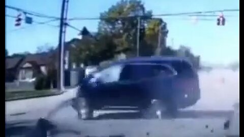 Someone Ran A Red Light & A Pedestrian's Life Was Saved By An SUV