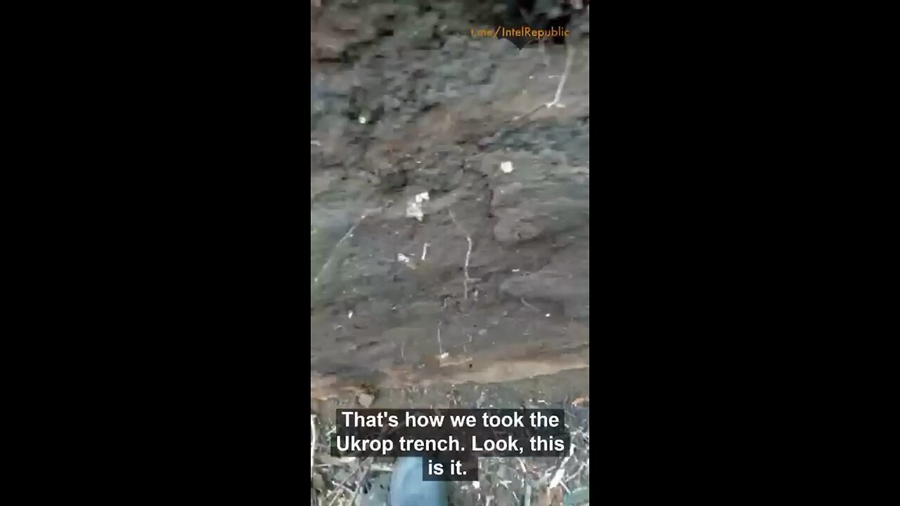 Russian soldier shows cleared trench