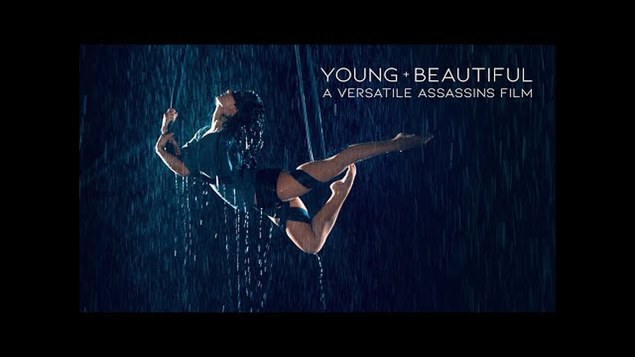VERSATILE ASSASSINS Young Beautiful Blindfolded Aerial Performance in Rain Room Selkie Hom