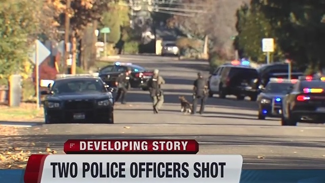 Polices officers in hospital after getting shot
