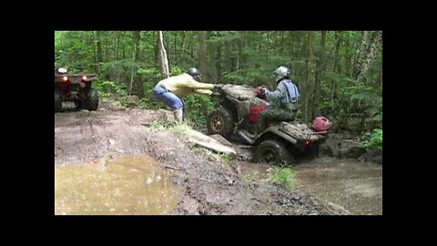 L'il John, Todd doing the 4 wheel thing. Somewhere in Eastern Ontario