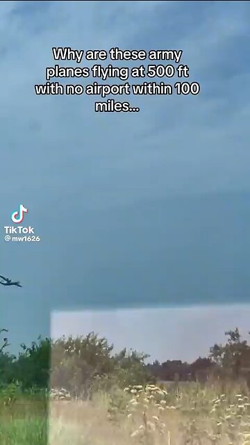 This military plane flying low with no airport in sight. WWG1WGA