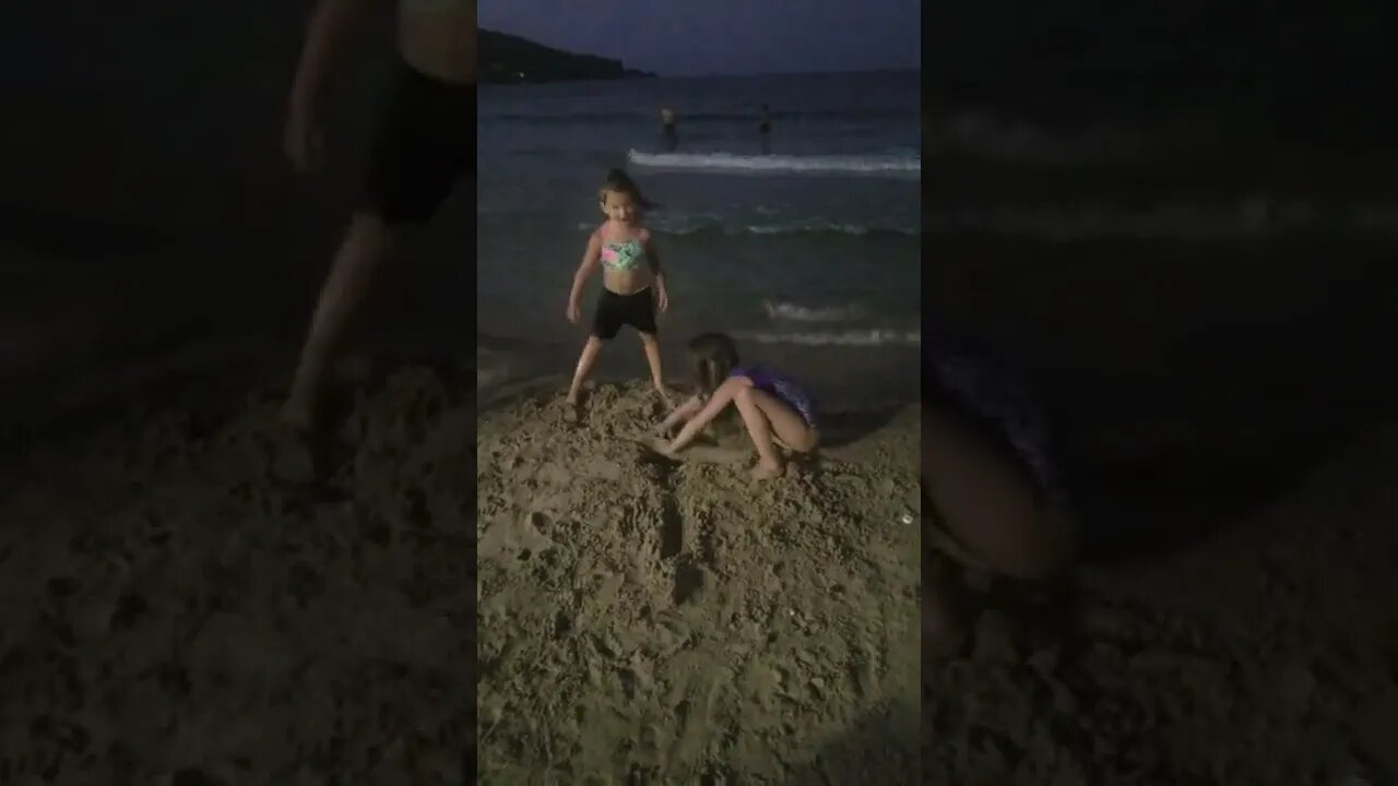 Kenza and Mary playing at the beach in Oran, Algeria