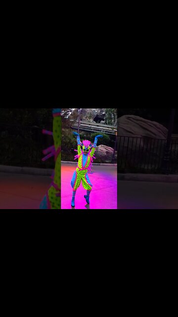 Coco alebrijes dancer in front of the Matterhorn #disneyland #magichappens #coco #alebrijes #parade