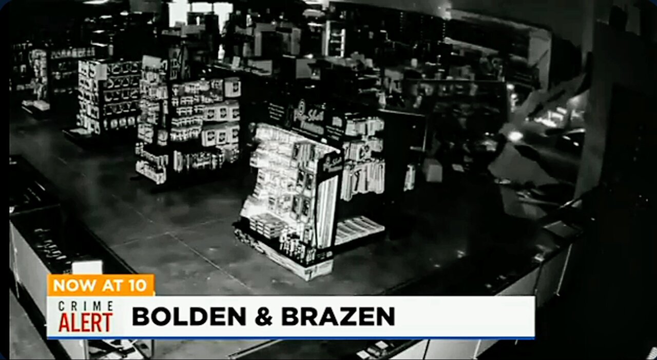 Footage of a Car Driven through a gun store by suspects to stockpile guns and steal them got n away