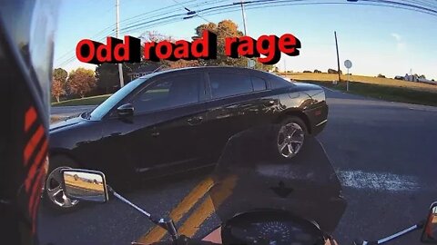 Mild Road rage: Charger driver yells at Motorcyclist.