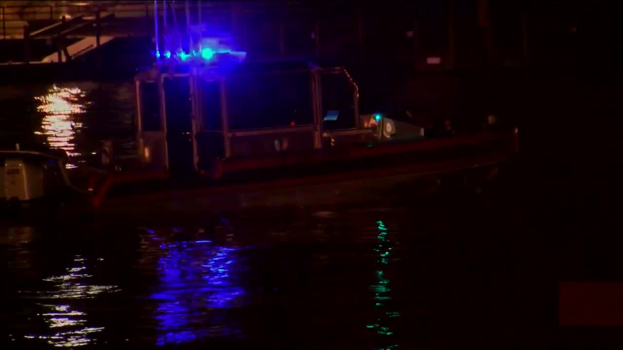 Rescue swimmers search for person in Sheboygan River