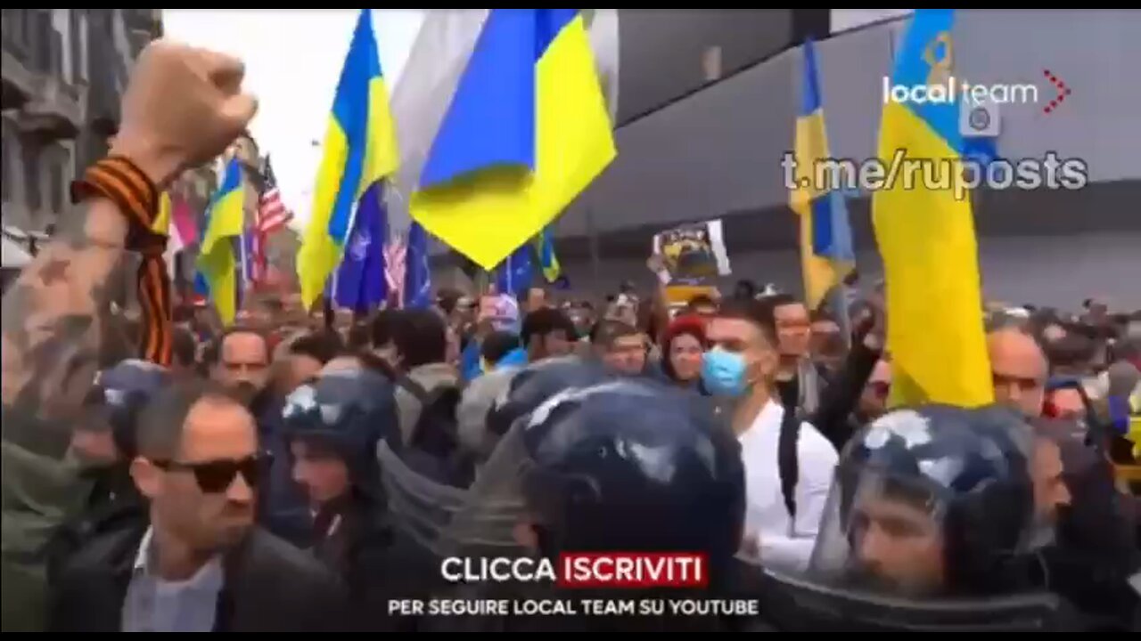 Ukrainians chanting Nazi-era slogans descend on Italy