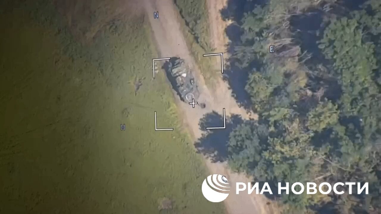 Russian drone strike on Ukrainian armoured vehicle