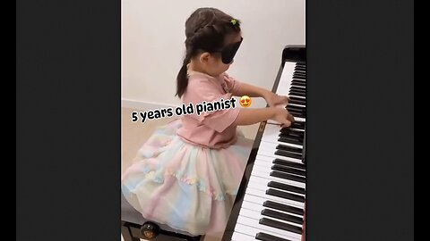 Blindfolded Five Year Old Pianist