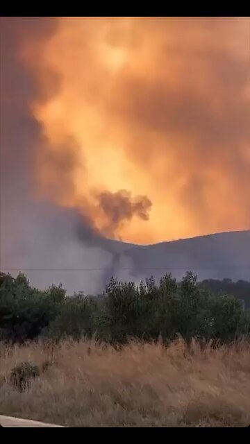 Wildfires in grease spread to ammunition depot leading to a huge explosion￼